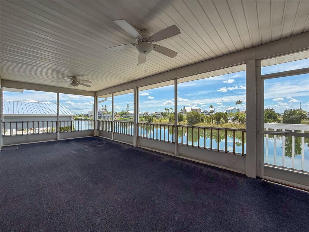 3342 Turks Cap Drive Hernando Beach, FL 34607 - Photo 30 of 100 a view of an empty room with a large window