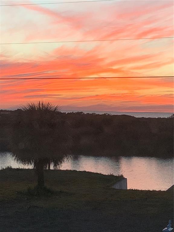 3342 Turks Cap Drive Hernando Beach, FL 34607 - Photo 41 of 100 a view of mountain with sunset