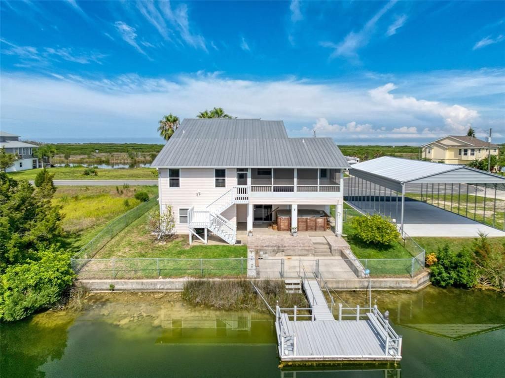 3342 Turks Cap Drive Hernando Beach, FL 34607 - Photo 69 of 100 a aerial view of a house with swimming pool garden and patio