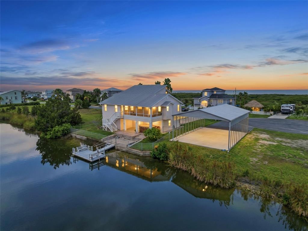 3342 Turks Cap Drive Hernando Beach, FL 34607 - Photo 7 of 100 an aerial view of a house with a garden
