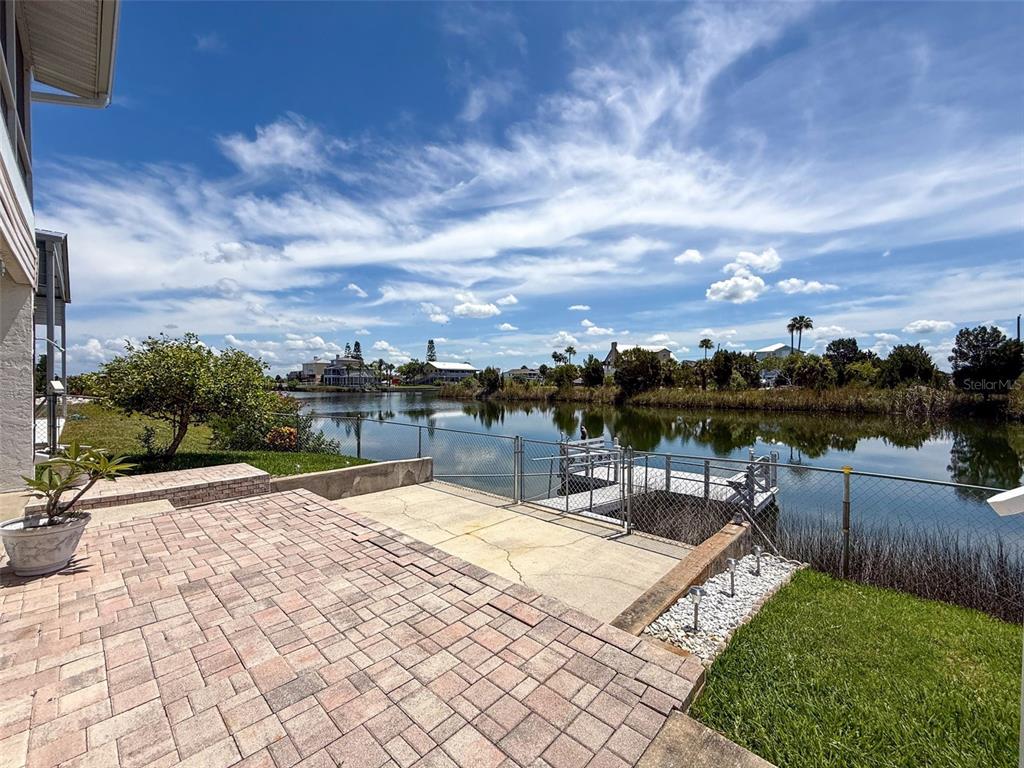 3342 Turks Cap Drive Hernando Beach, FL 34607 - Photo 74 of 100 a view of a swimming pool with a patio
