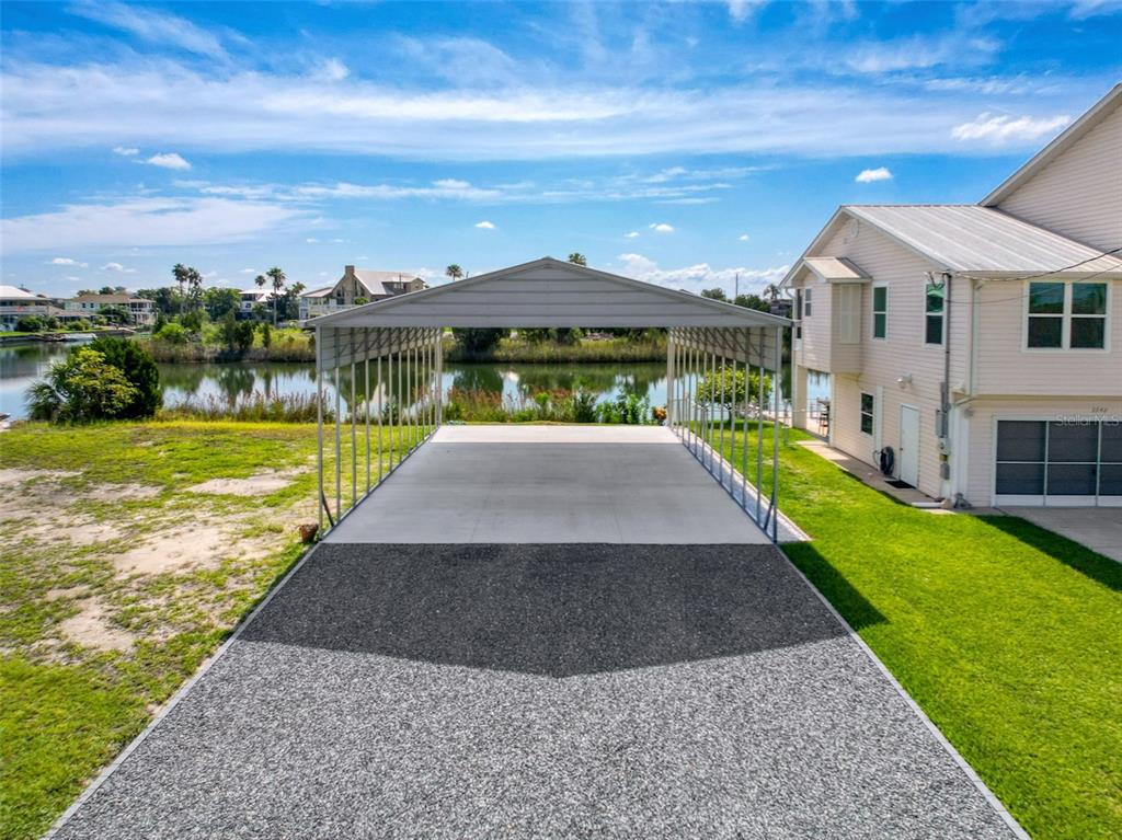 3342 Turks Cap Drive Hernando Beach, FL 34607 - Photo 78 of 94 a view of a patio with a yard