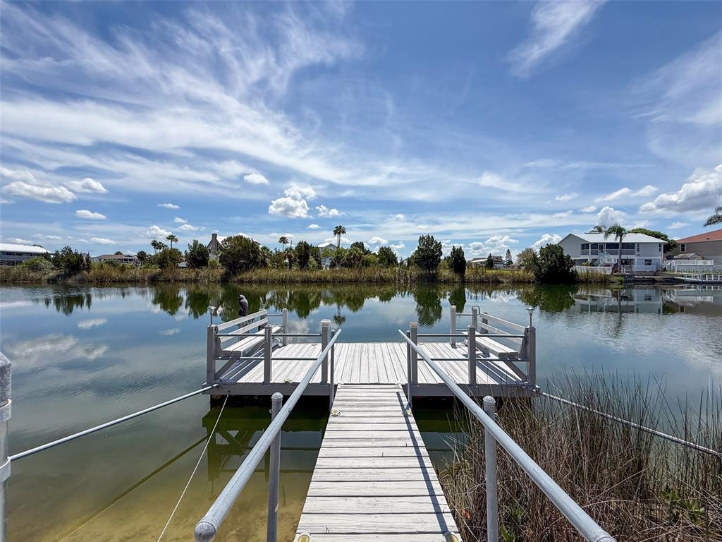 3342 Turks Cap Drive Hernando Beach, FL 34607 - Photo 78 of 100 a view of a lake with sitting area