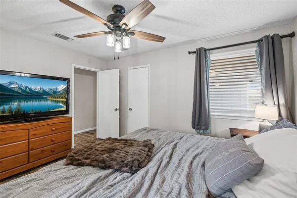 a bathroom with a sink vanity and a mirror