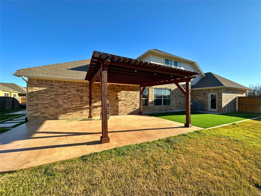 3117 Hidalgo Loop Round Rock, TX 78665 - Photo 27 of 27 a view of a house with a yard