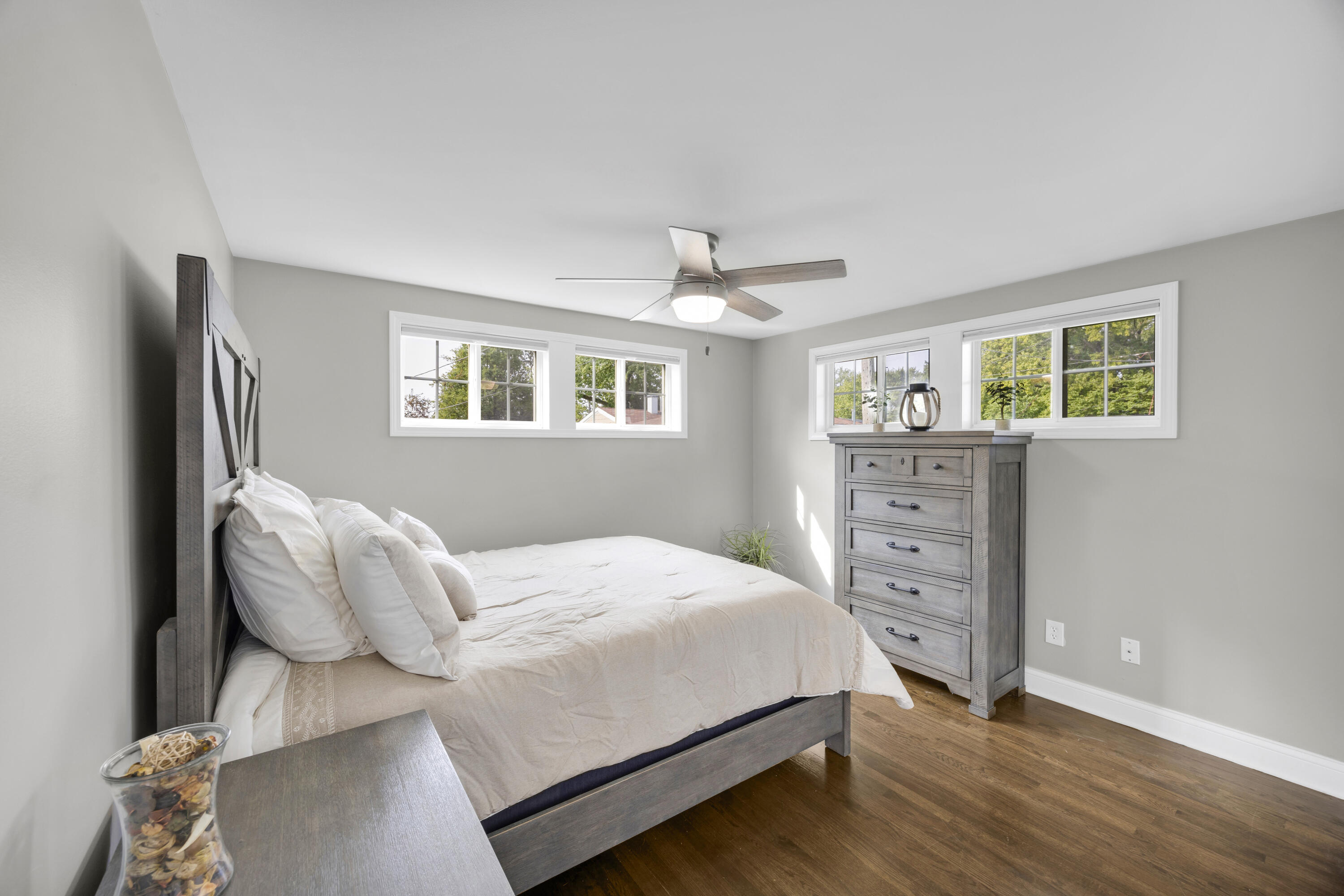 549 Ridgelawn Street Crown Point, IN 46307 - Photo 12 of 18 a bedroom with a bed and a window