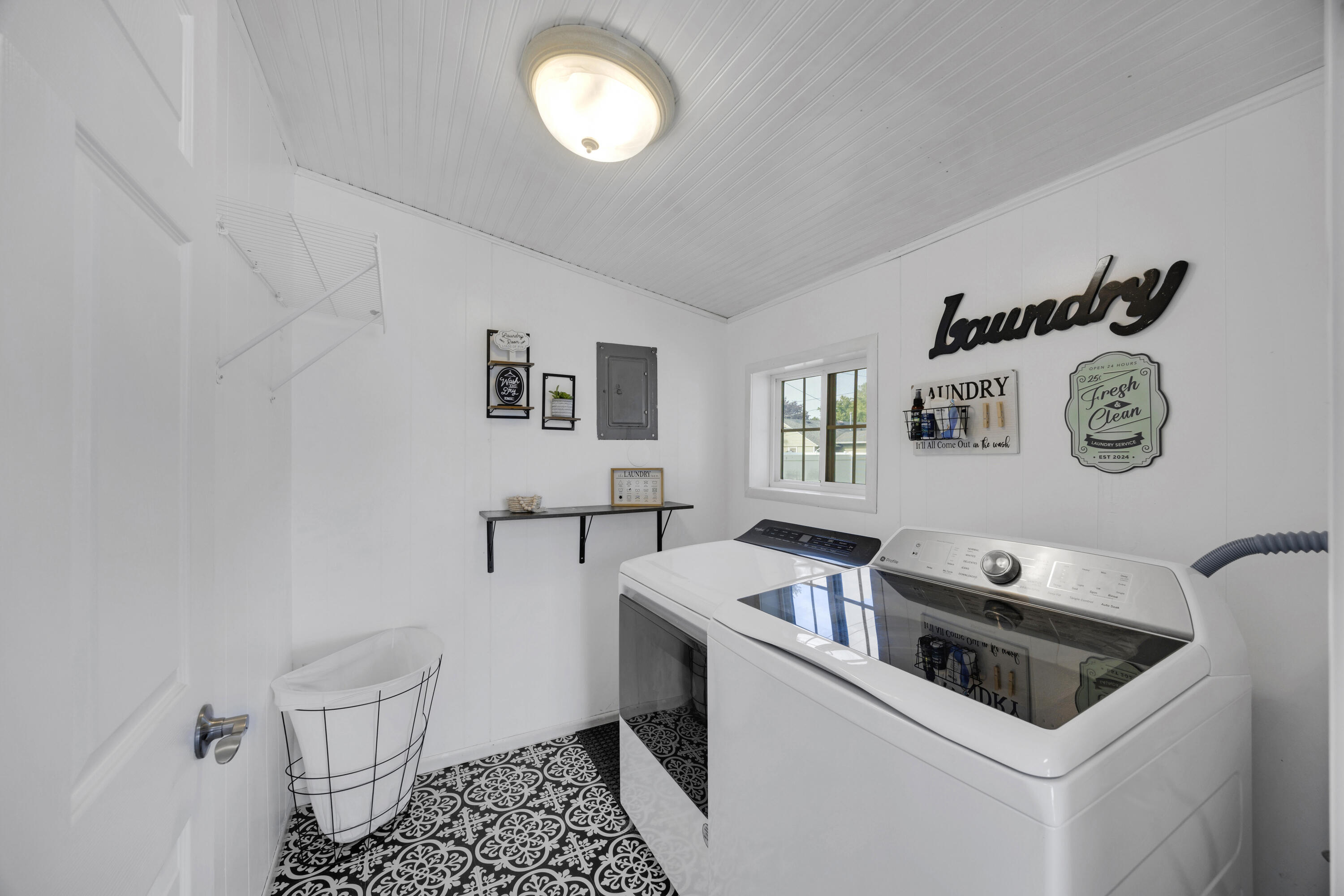 549 Ridgelawn Street Crown Point, IN 46307 - Photo 16 of 18 a kitchen with a refrigerator and a stove top oven