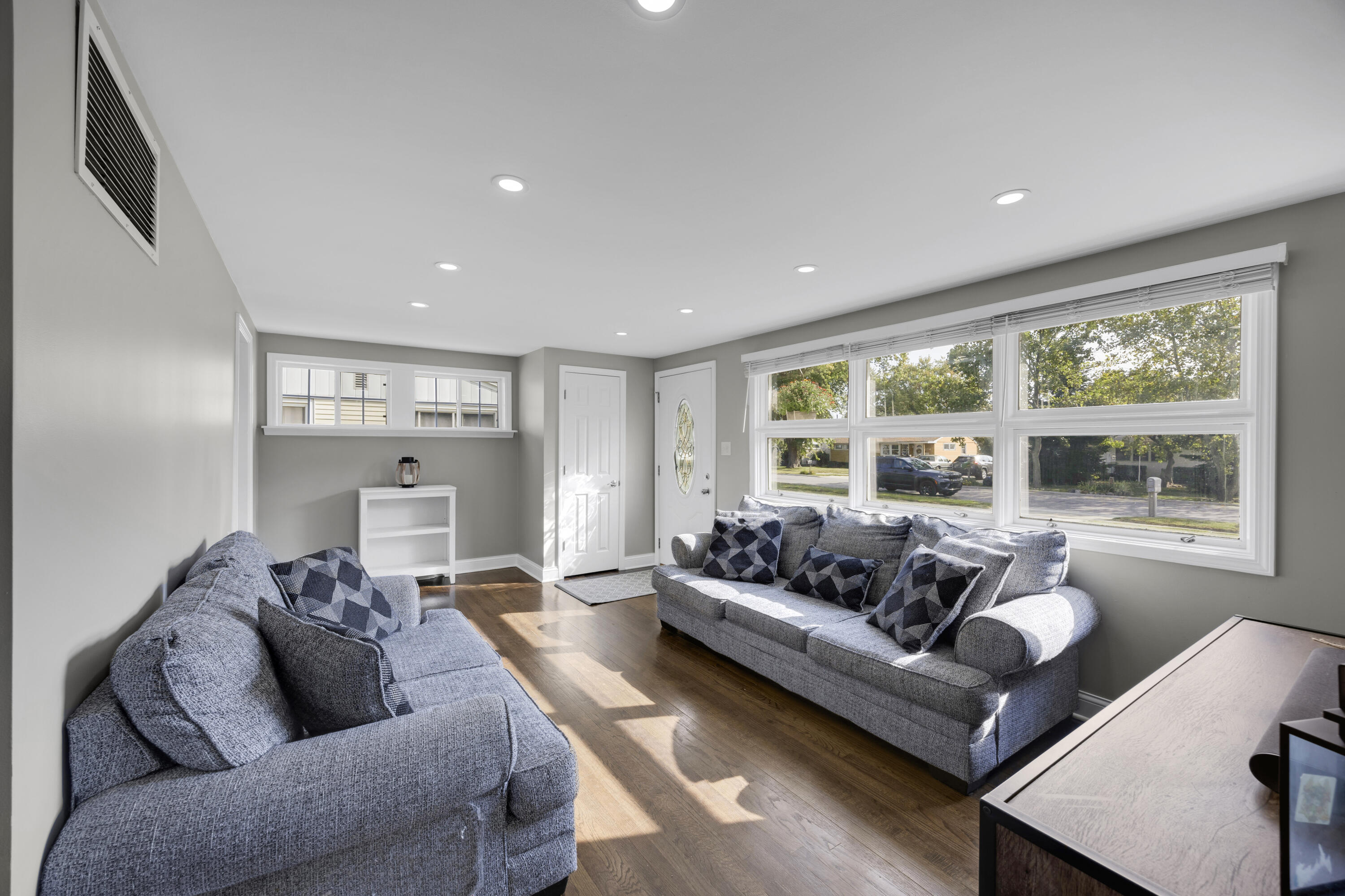 549 Ridgelawn Street Crown Point, IN 46307 - Photo 3 of 18 a living room with furniture and a large window
