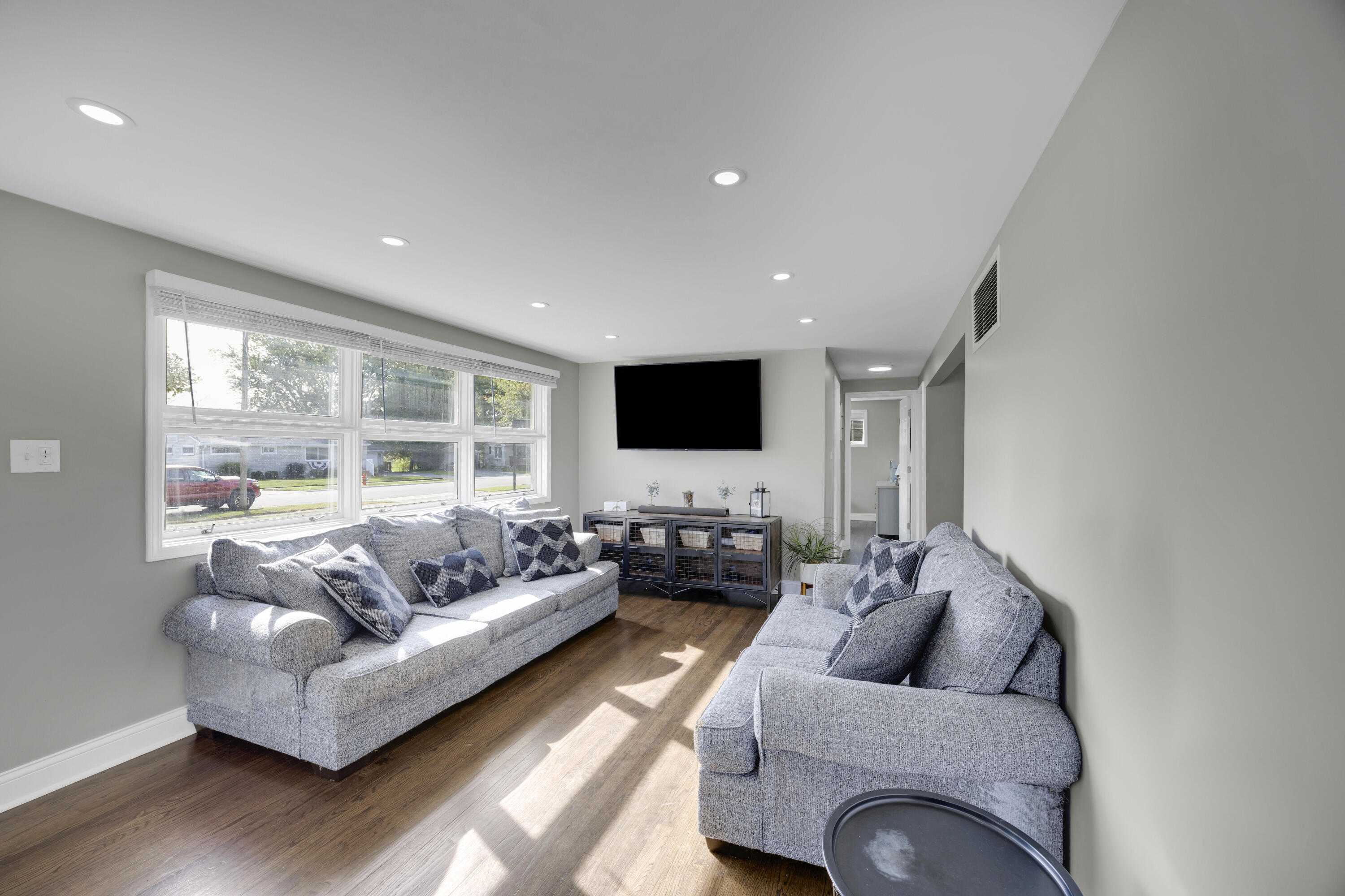 549 Ridgelawn Street Crown Point, IN 46307 - Photo 4 of 18 a living room with furniture and a flat screen tv