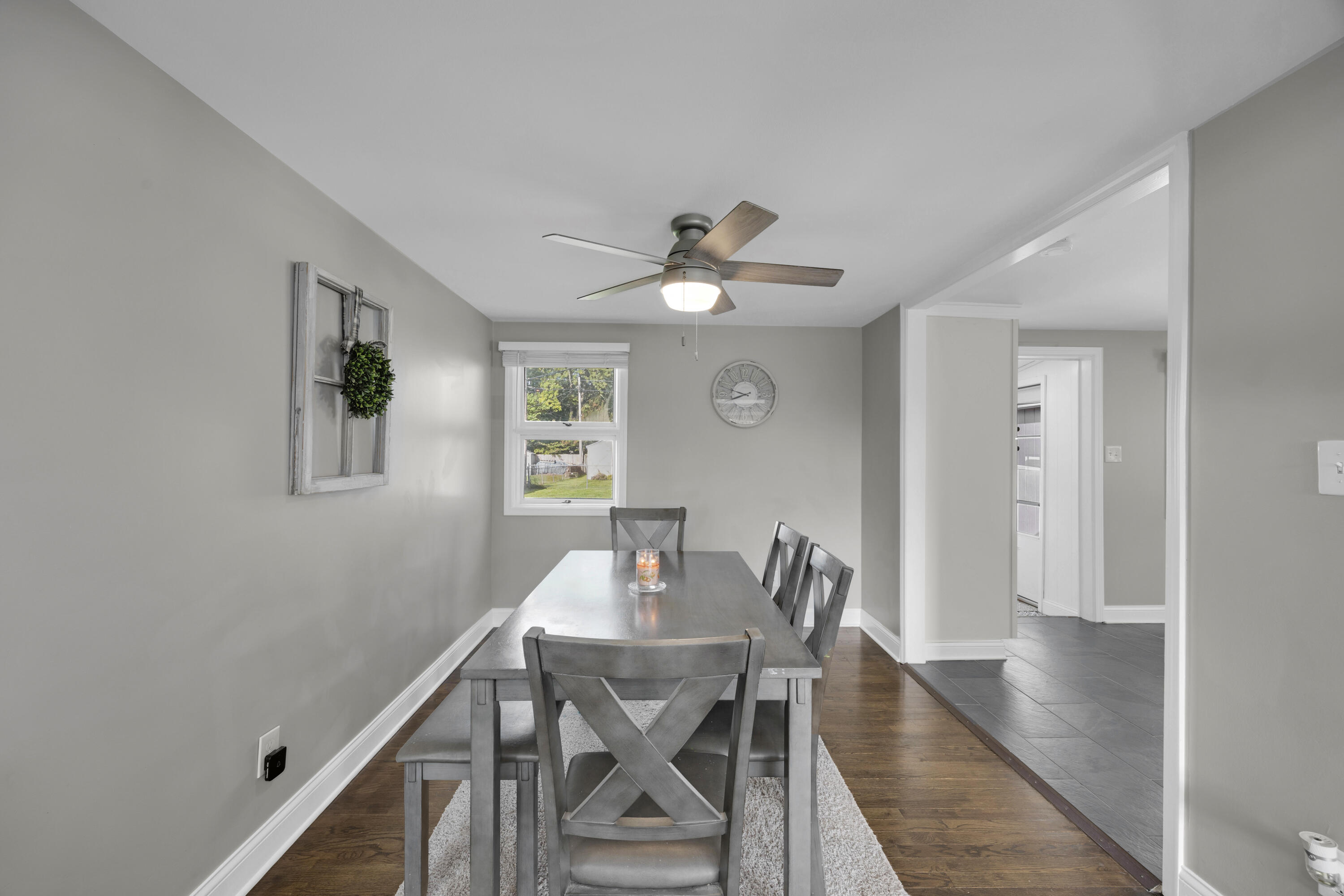 549 Ridgelawn Street Crown Point, IN 46307 - Photo 6 of 18 a view of a dining room with furniture and wooden floor