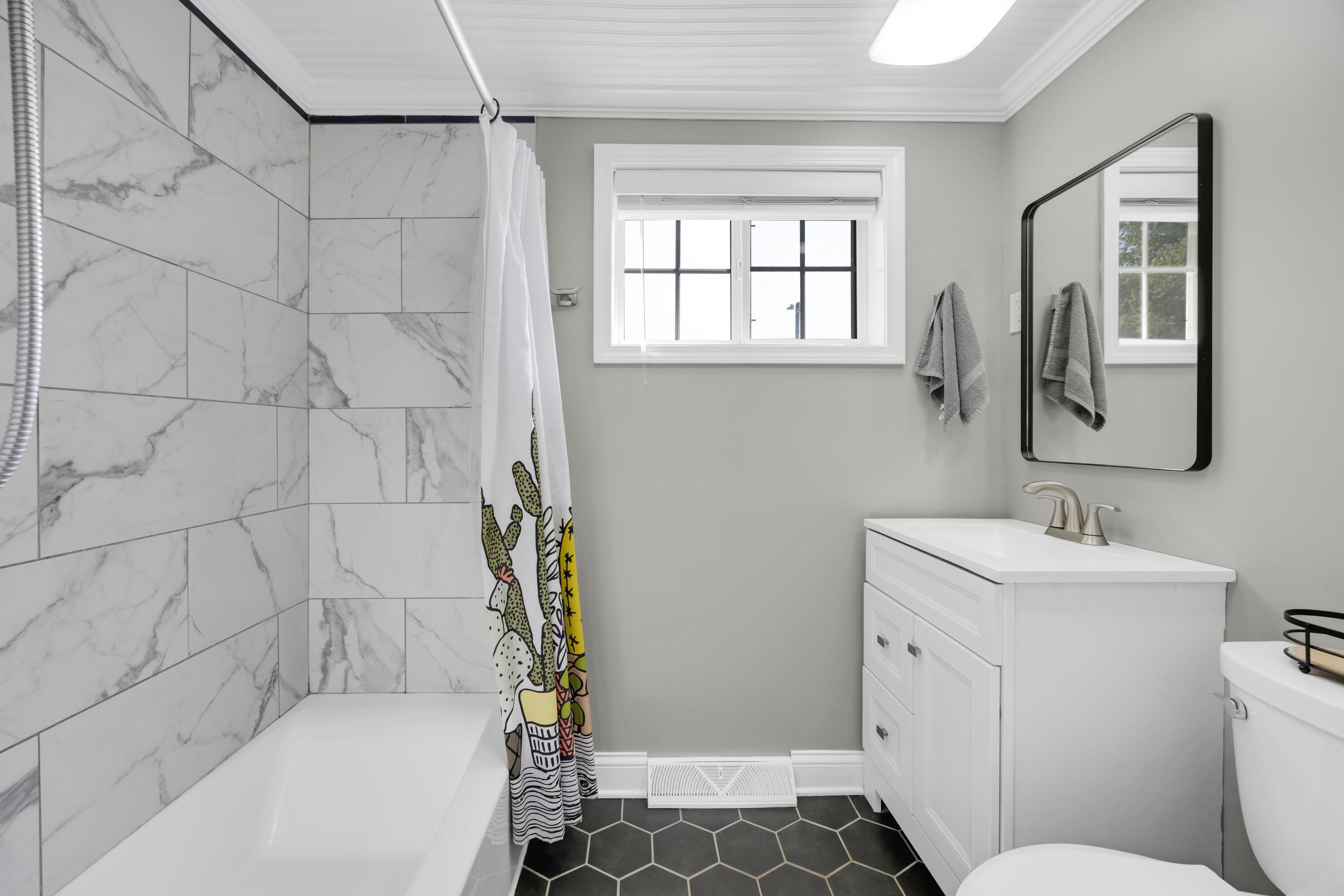 549 Ridgelawn Street Crown Point, IN 46307 - Photo 9 of 18 a bathroom with a sink a toilet and shower