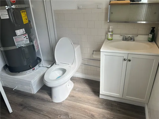 a bathroom with a toilet and a sink