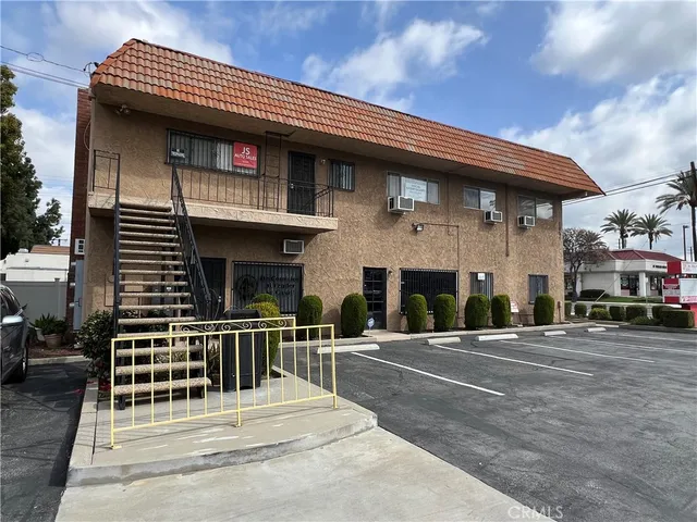 a view of a building with a street