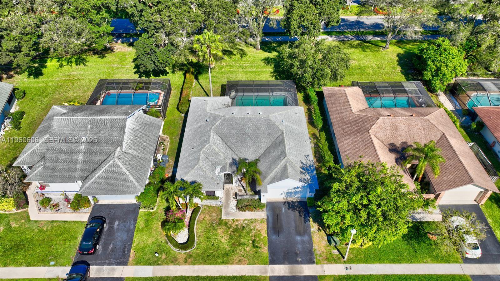 18352 181st Circle South Boca Raton, FL 33498 - Photo 3 of 13 an aerial view of house with yard swimming pool and outdoor seating