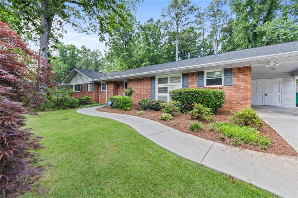 a view of backyard of a house