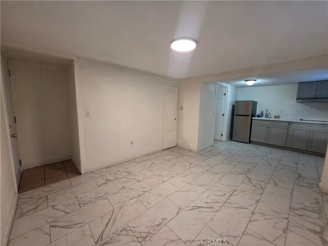 a view of a kitchen with a sink