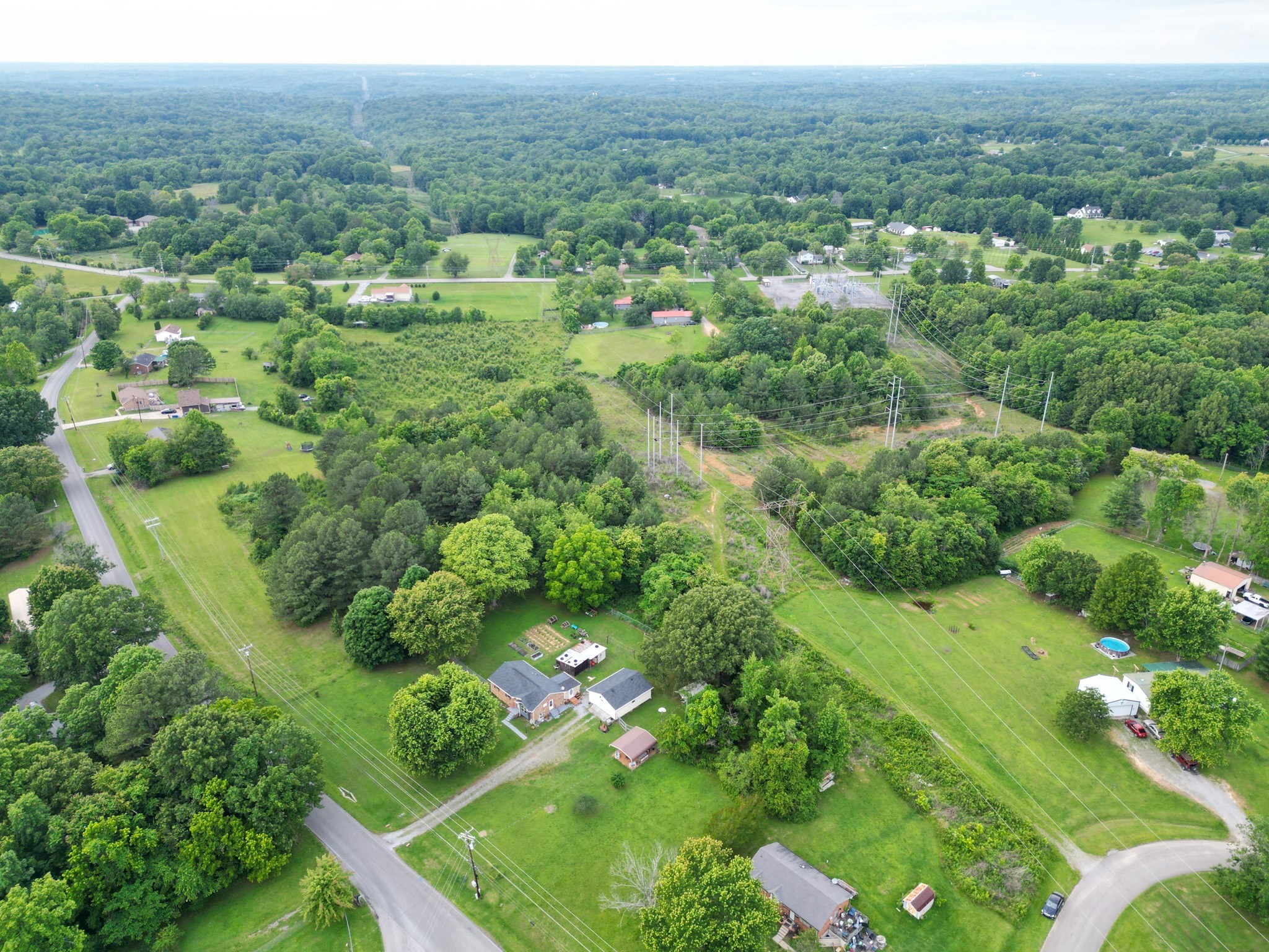 0 Raybon Binkley Road Ashland City, TN 37015 - Photo 17 of 32 a view of a green yard with large trees