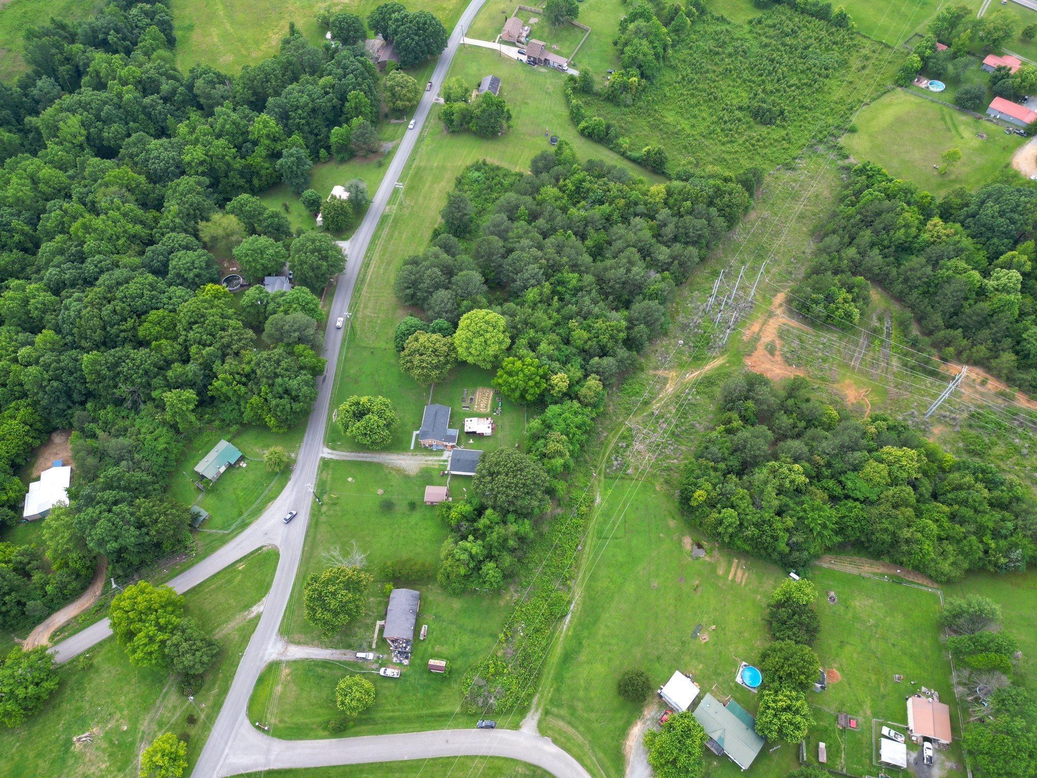 0 Raybon Binkley Road Ashland City, TN 37015 - Photo 2 of 32 a backyard of a house with lots of green space and outdoor seating