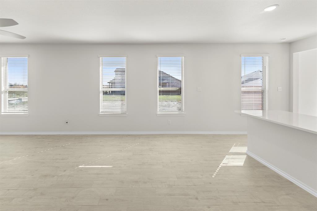 125 Pheasant Run Road Terrell, TX 75160 - Photo 12 of 27 an empty room with windows