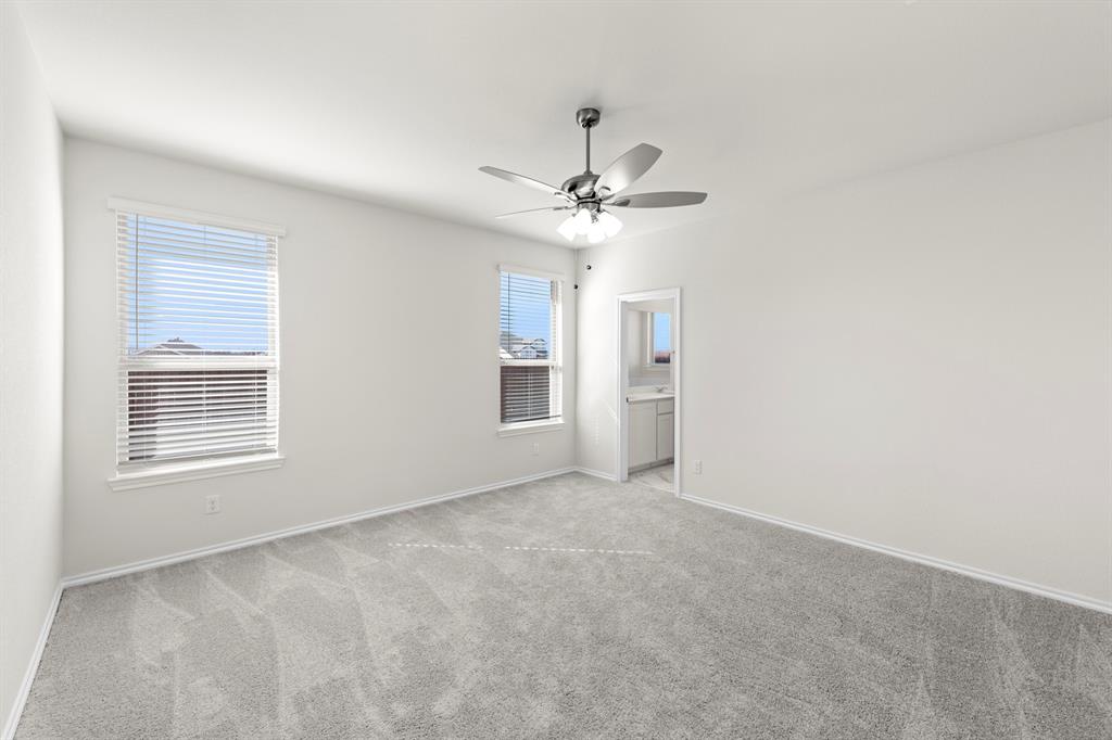 125 Pheasant Run Road Terrell, TX 75160 - Photo 18 of 27 a view of an empty room with a window
