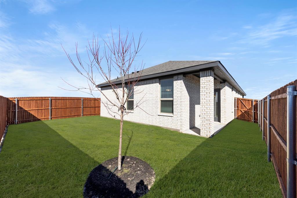 125 Pheasant Run Road Terrell, TX 75160 - Photo 27 of 27 a house view with a garden space