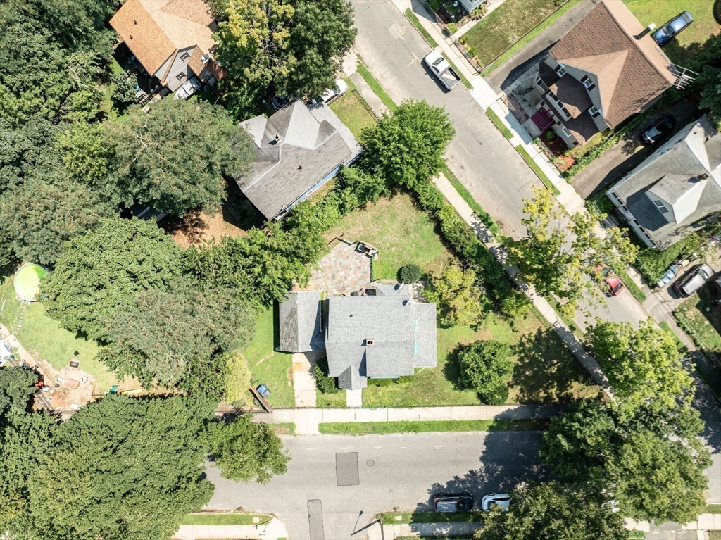 55 Pasadena Street Springfield, MA 01108 - Photo 31 of 33 an aerial view of a house with a yard