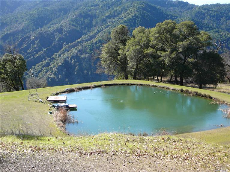 13460 Poonkinney Road Dos Rios, CA 95429 - Photo 1 of 1 a view of a lake view