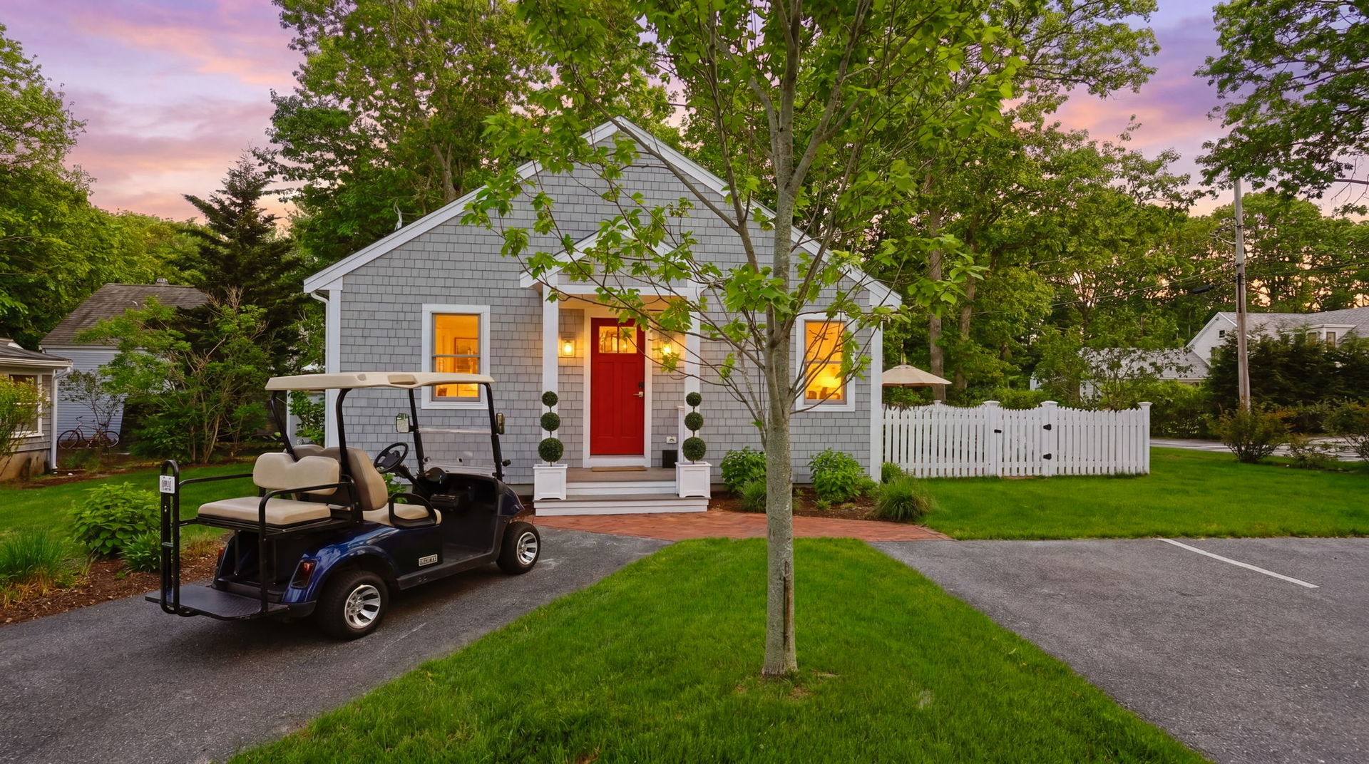 a view of a house with a back yard