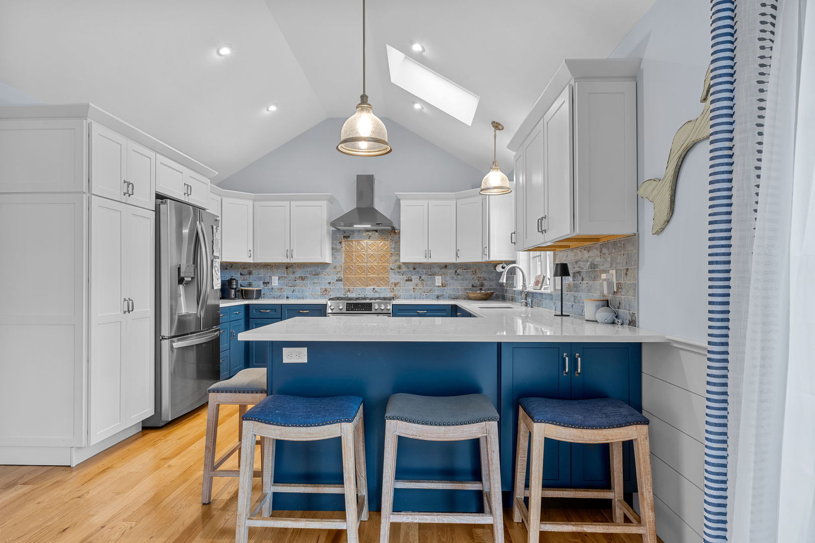 16 2nd Avenue Osterville, MA 02655 - Photo 12 of 49 a kitchen with cabinets and stainless steel appliances