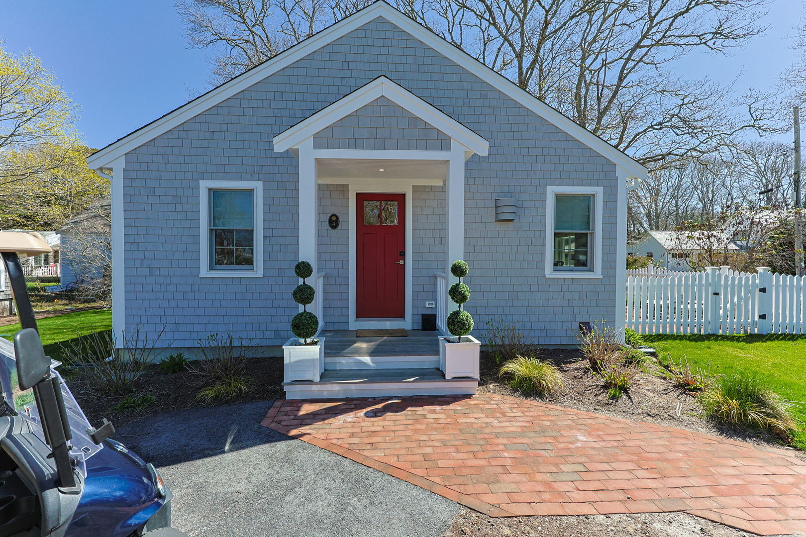 16 2nd Avenue Osterville, MA 02655 - Photo 38 of 49 a front view of a house with garden