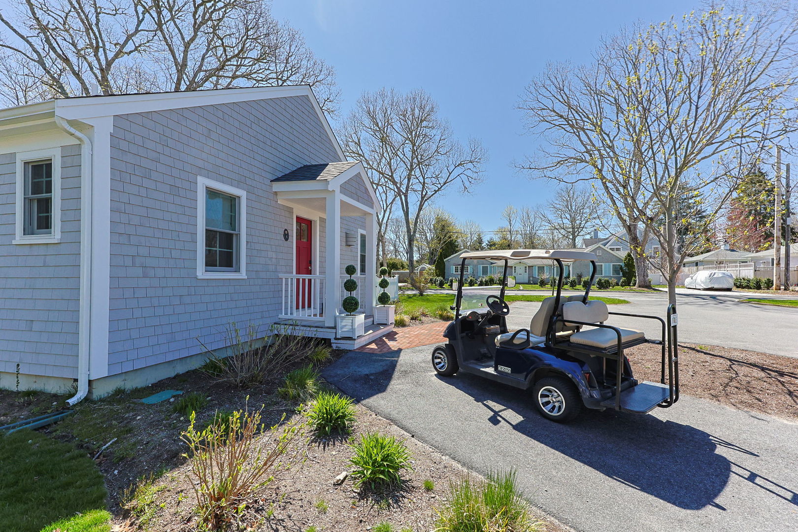 16 2nd Avenue Osterville, MA 02655 - Photo 42 of 49 a view of a yard with cars