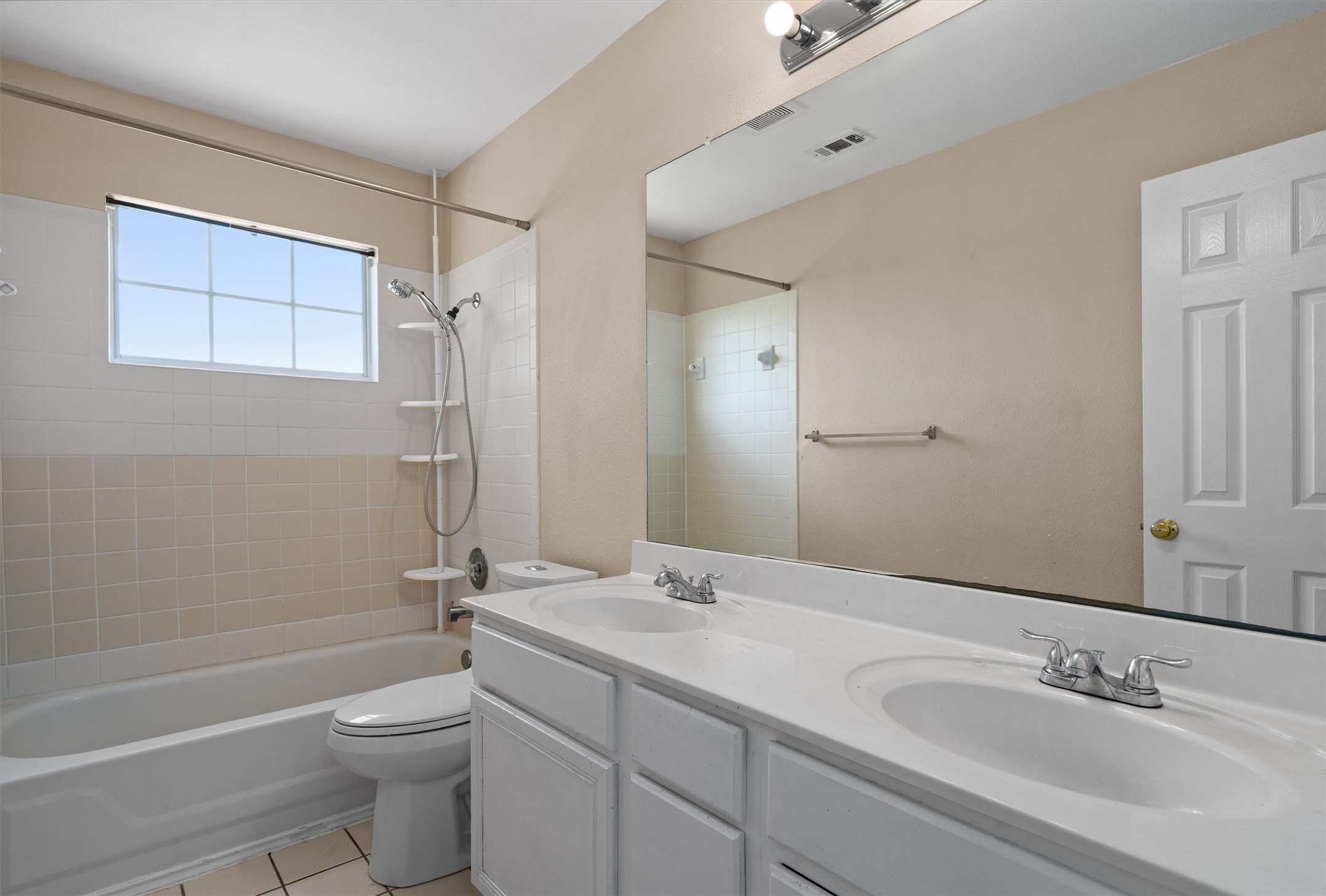 100 Parque Circle Georgetown, TX 78626 - Photo 28 of 39 a bathroom with a granite countertop sink a toilet and shower