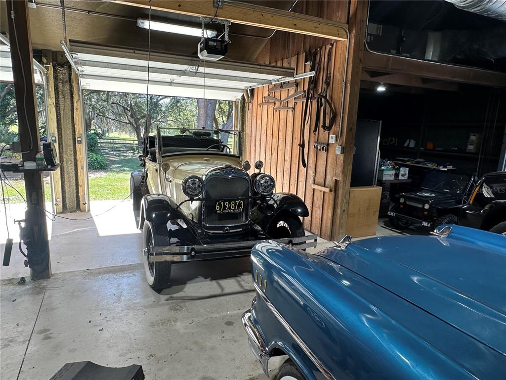 36203 Micro Racetrack Road Fruitland Park, FL 34731 - Photo 11 of 72 a view of workspace with wooden floor and furniture