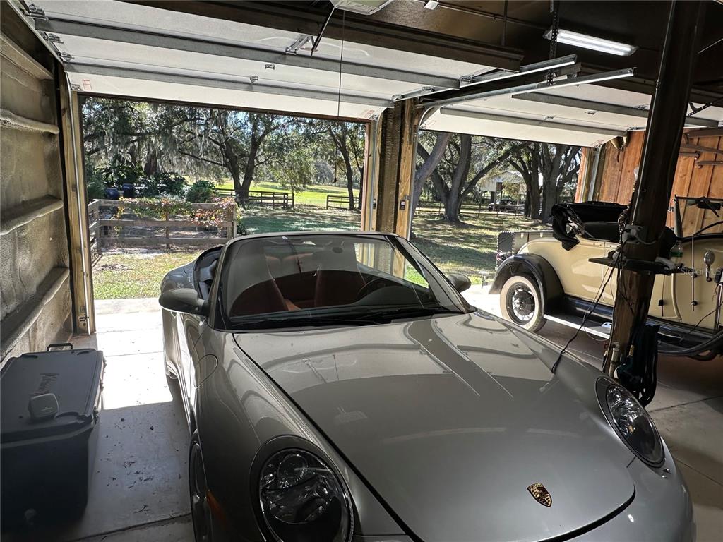 36203 Micro Racetrack Road Fruitland Park, FL 34731 - Photo 12 of 72 a bathroom with a sink and mirror