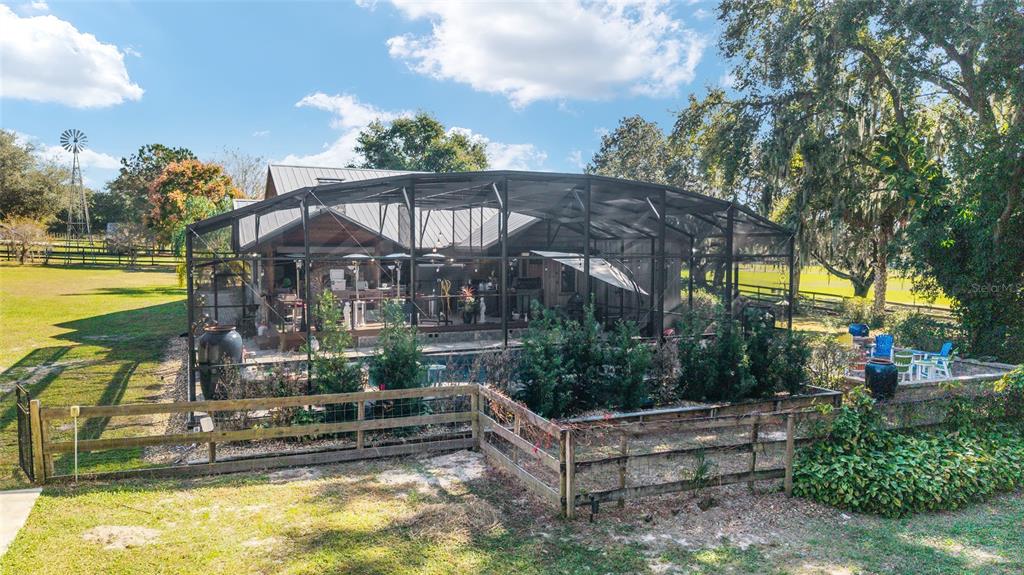 36203 Micro Racetrack Road Fruitland Park, FL 34731 - Photo 23 of 72 a view of a house with a yard balcony and sitting area