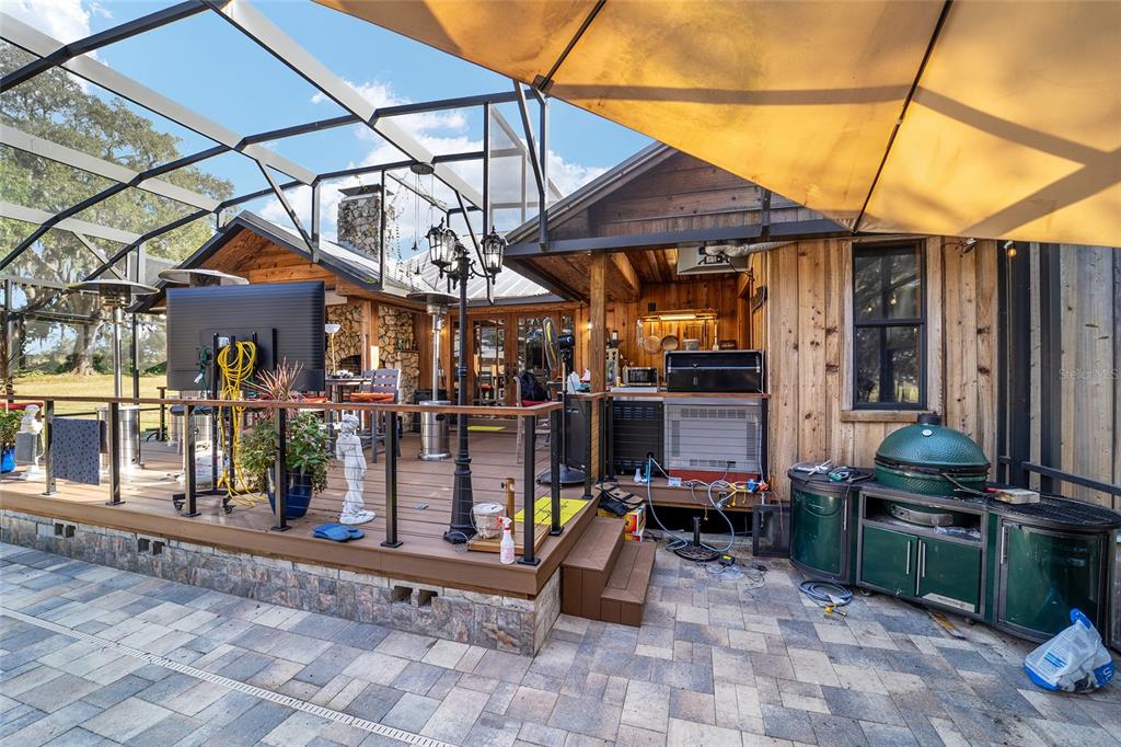 36203 Micro Racetrack Road Fruitland Park, FL 34731 - Photo 62 of 72 a view of a chairs and table in the patio