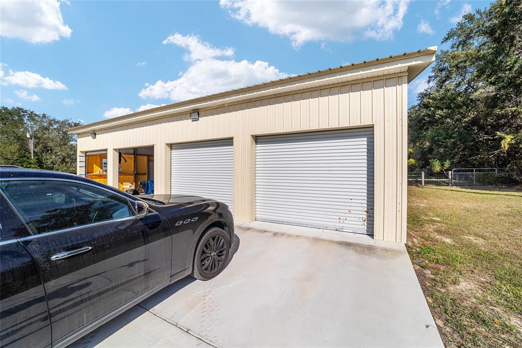 36203 Micro Racetrack Road Fruitland Park, FL 34731 - Photo 67 of 72 a view of a car parked front of a house