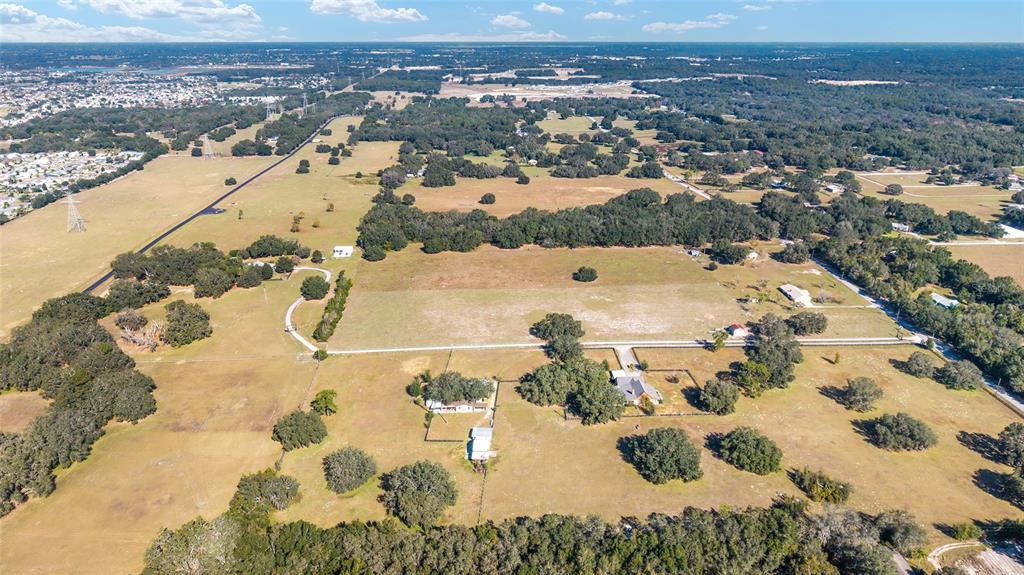 36203 Micro Racetrack Road Fruitland Park, FL 34731 - Photo 71 of 72 an aerial view of residential houses with outdoor space
