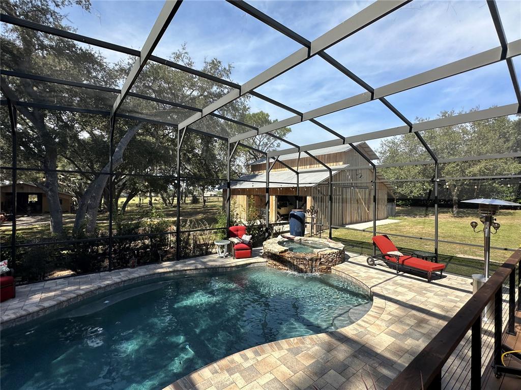 36203 Micro Racetrack Road Fruitland Park, FL 34731 - Photo 8 of 72 a view of a couches in the patio