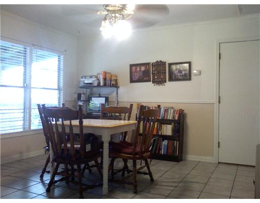 1509 Austin Street Portland, TX 78374 - Photo 3 of 10 a view of a dining room with furniture