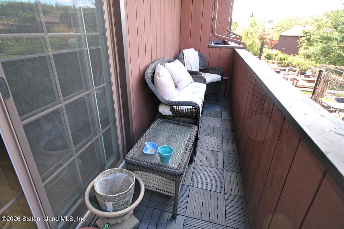 951 West Fingerboard Road Staten Island, NY 10304 - Photo 25 of 29 a view of balcony door and chair