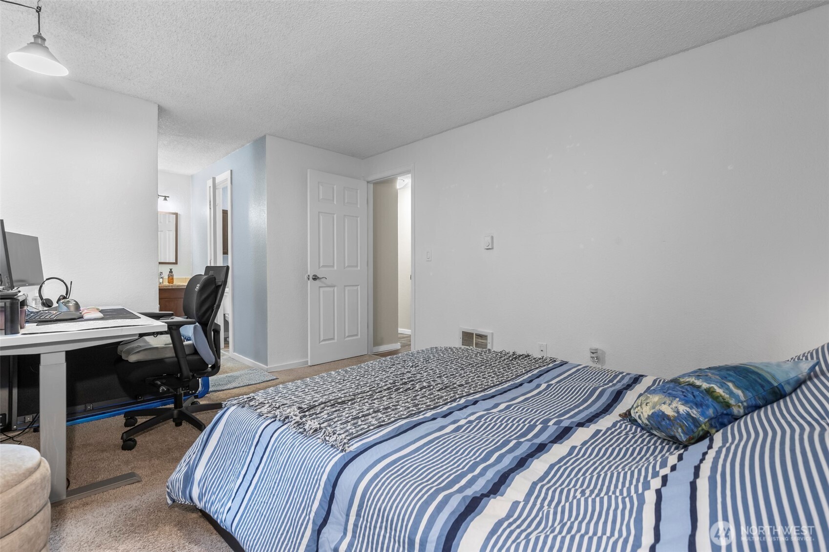 157 South 330th Street, Unit A Federal Way, WA 98003 - Photo 12 of 21 a bedroom with a bed and a desk