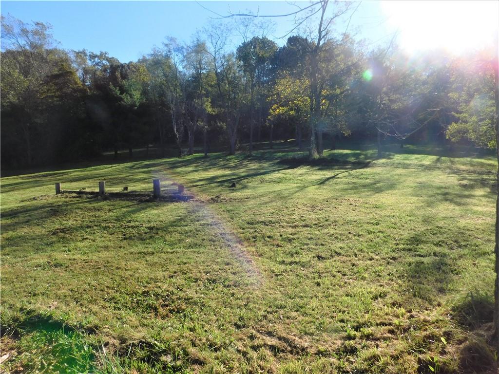 939 Yukon Road Ruffs Dale, PA 15679 - Photo 22 of 22 a view of outdoor space with deck and yard