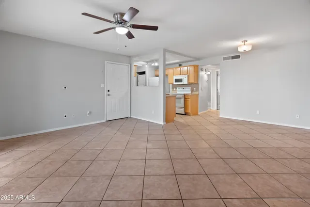 a view of an empty room and window