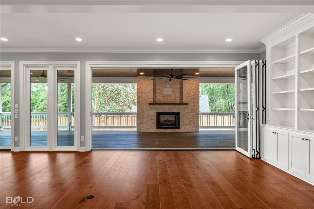 6012 East Ridge Drive Shreveport, LA 71106 - Photo 2 of 40 5 panel accordion door can be fully opened to expand the indoor/outdoor living space
