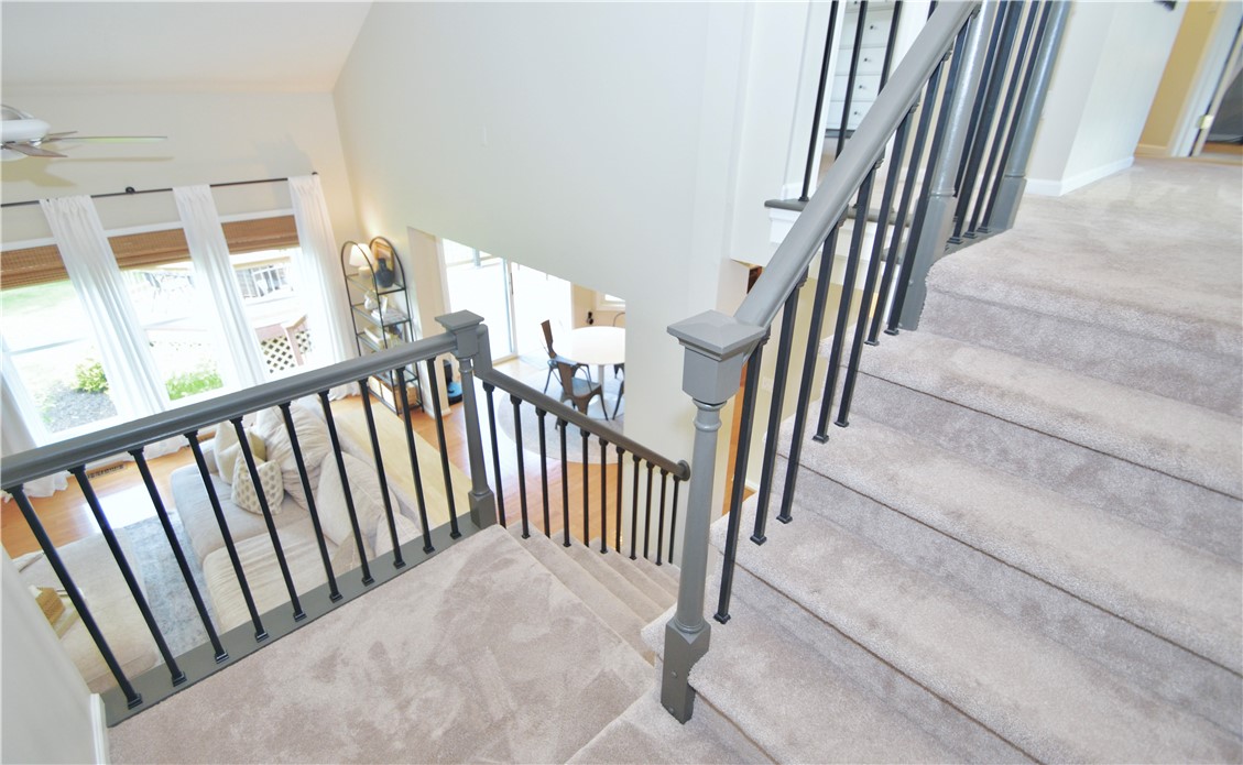 41 Ketchum Street Victor, NY 14564 - Photo 15 of 36 Staircase looking over living room