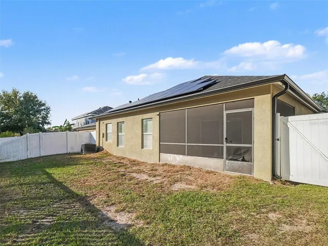 a house view with a backyard space