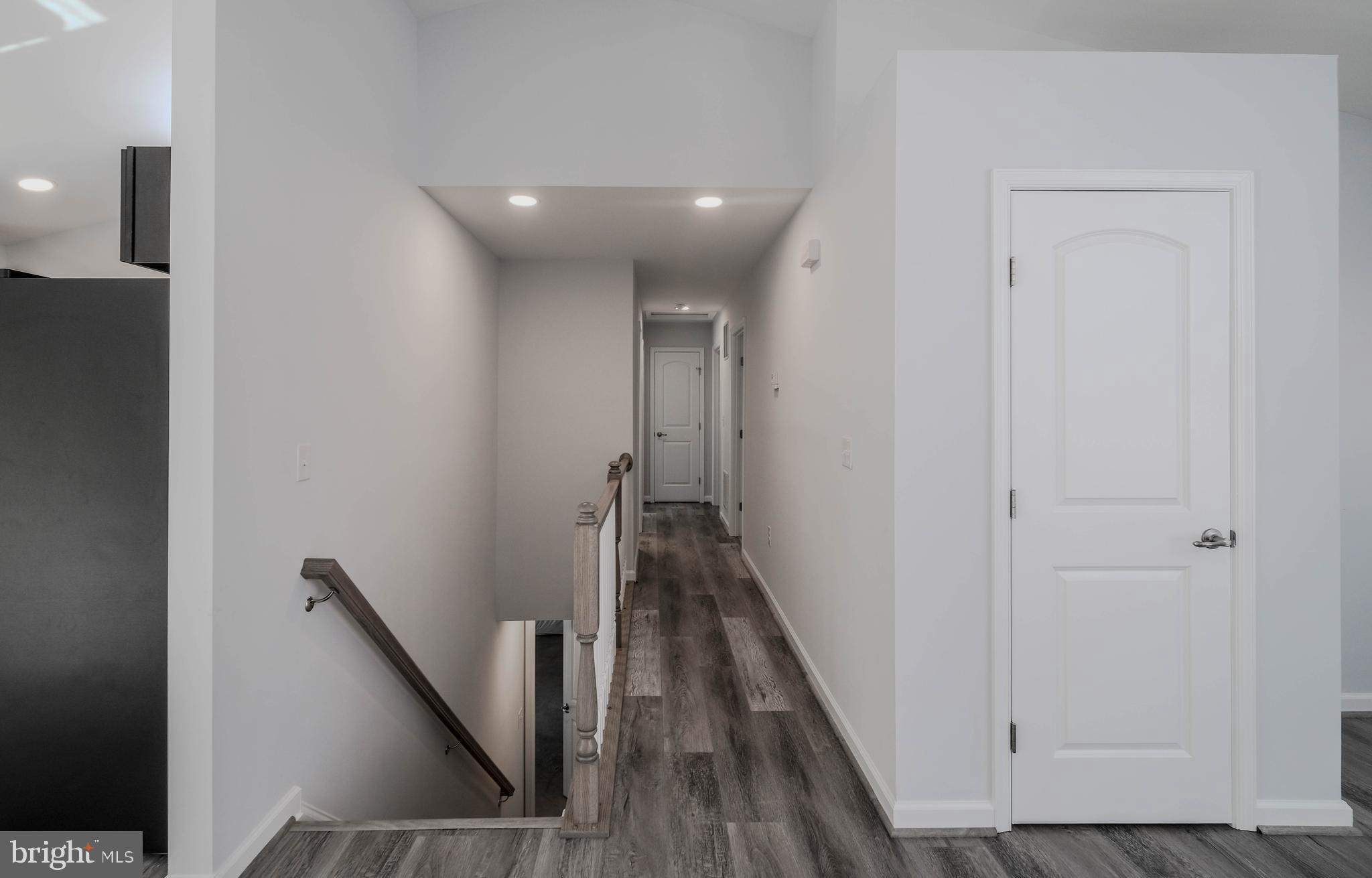 13 A West Strasburg Road Front Royal, VA 22630 - Photo 26 of 52 Plank flooring also on steps to lower level