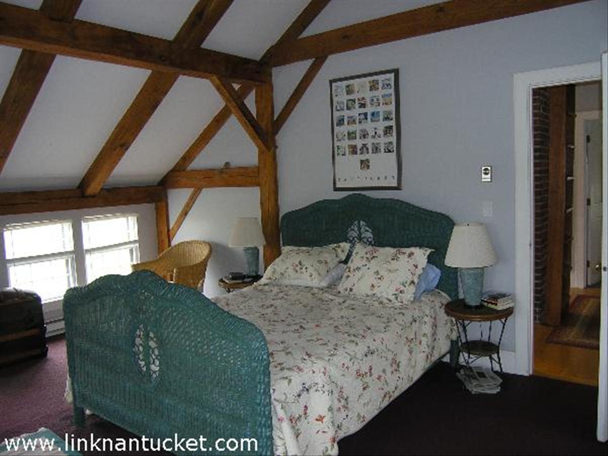 28 Miacomet Road Nantucket, MA 02554 - Photo 6 of 7 a living room with furniture