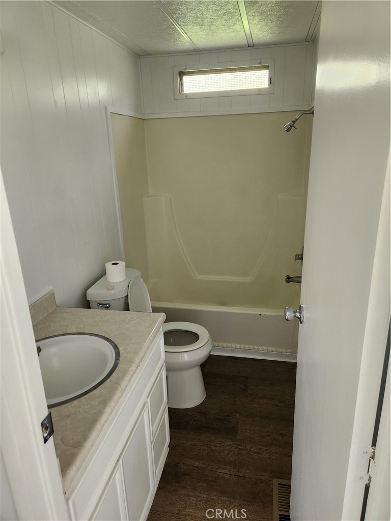 356 Chinese Wall Road Oroville, CA 95966 - Photo 18 of 30 a bathroom with a granite countertop toilet sink and mirror